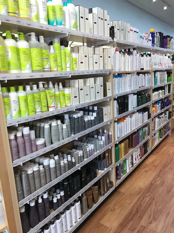 Pharmacist placing medication into a delivery bag